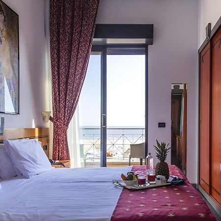 Hotel Nettunia Римини Экстерьер фото