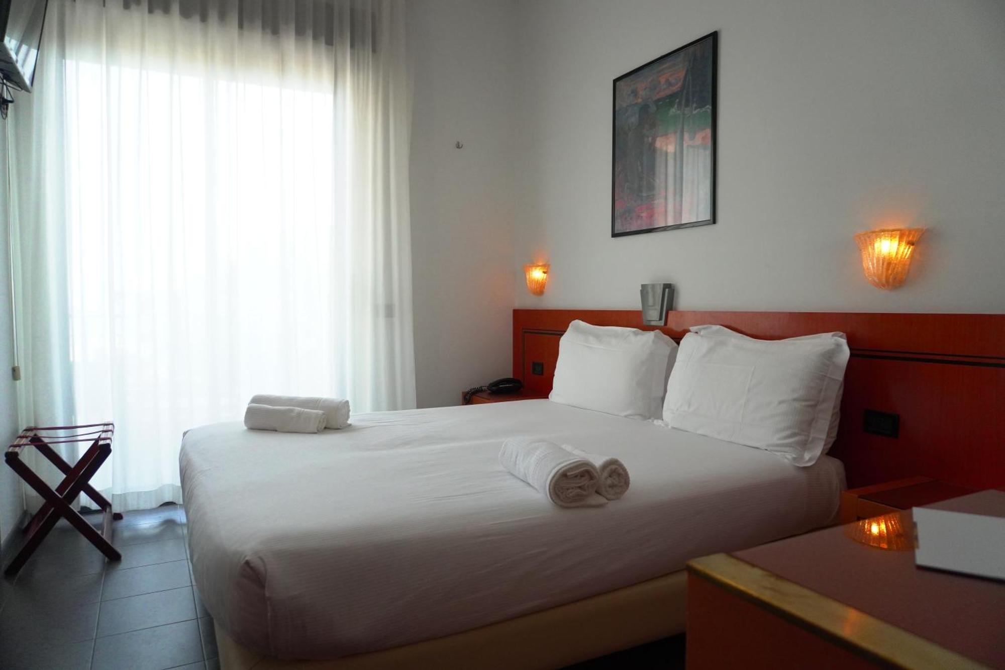 Hotel Nettunia Римини Номер фото