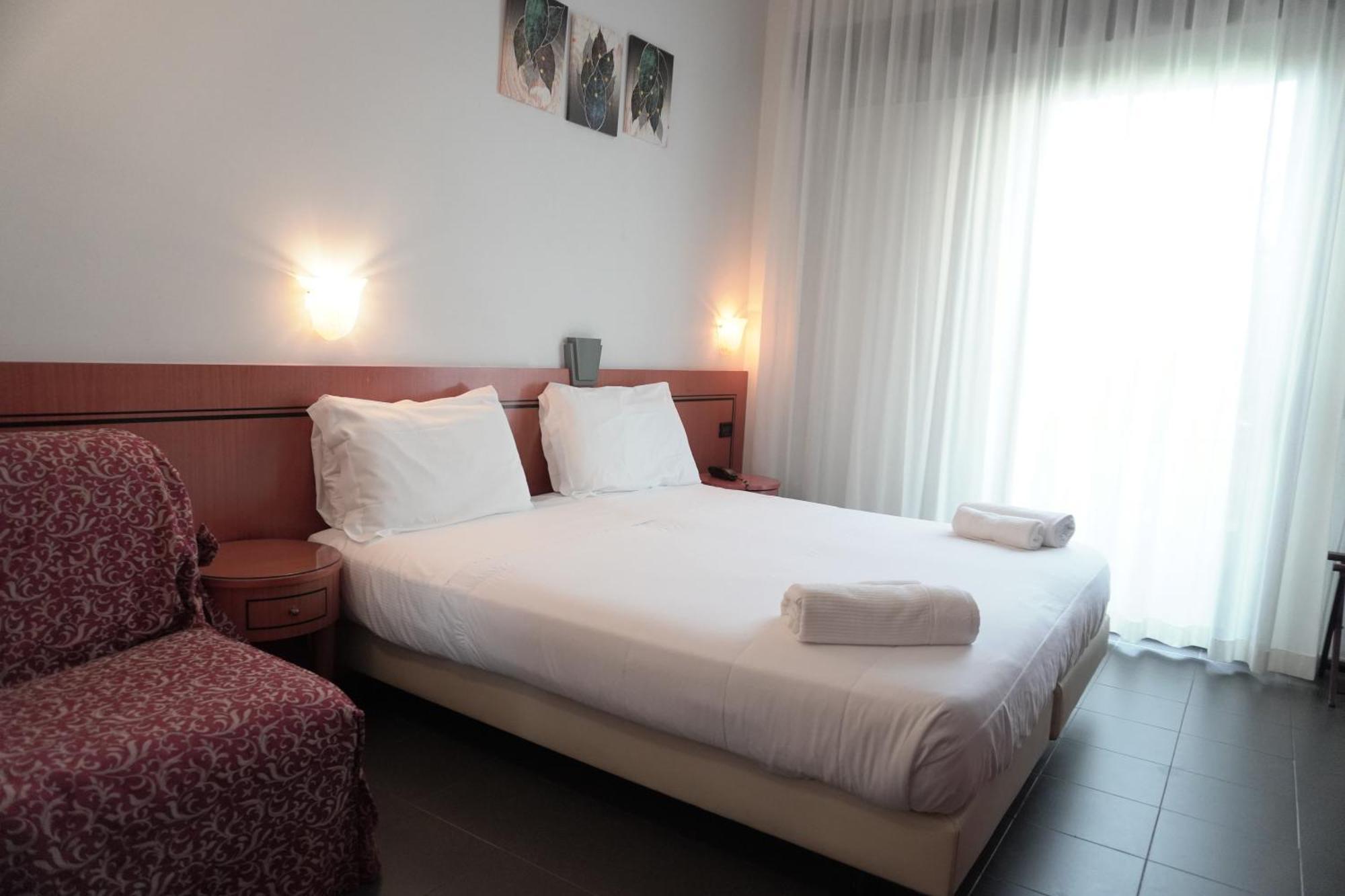 Hotel Nettunia Римини Номер фото