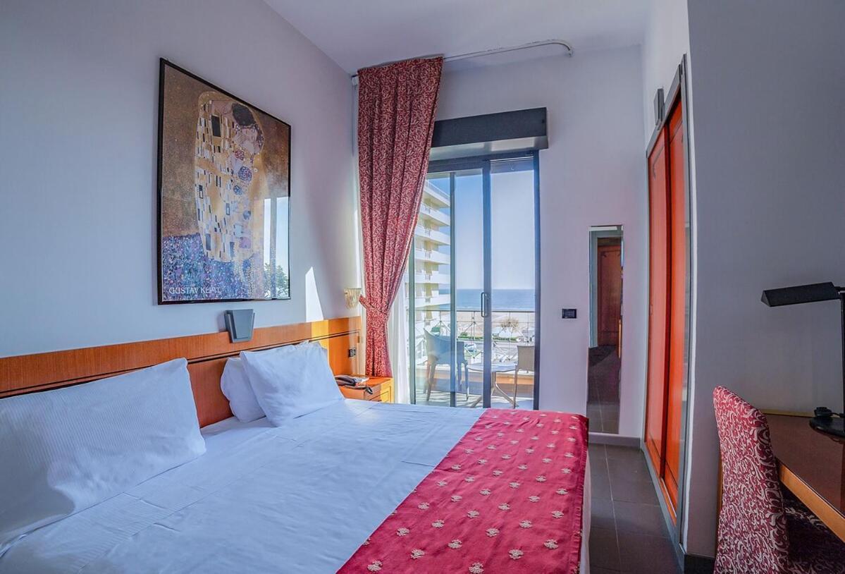 Hotel Nettunia Римини Номер фото