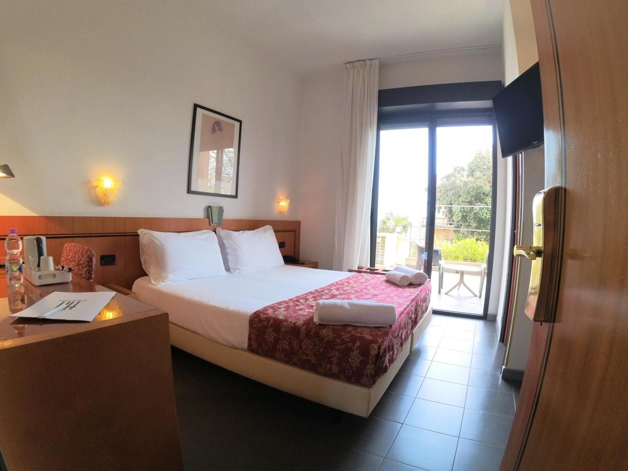 Hotel Nettunia Римини Номер фото