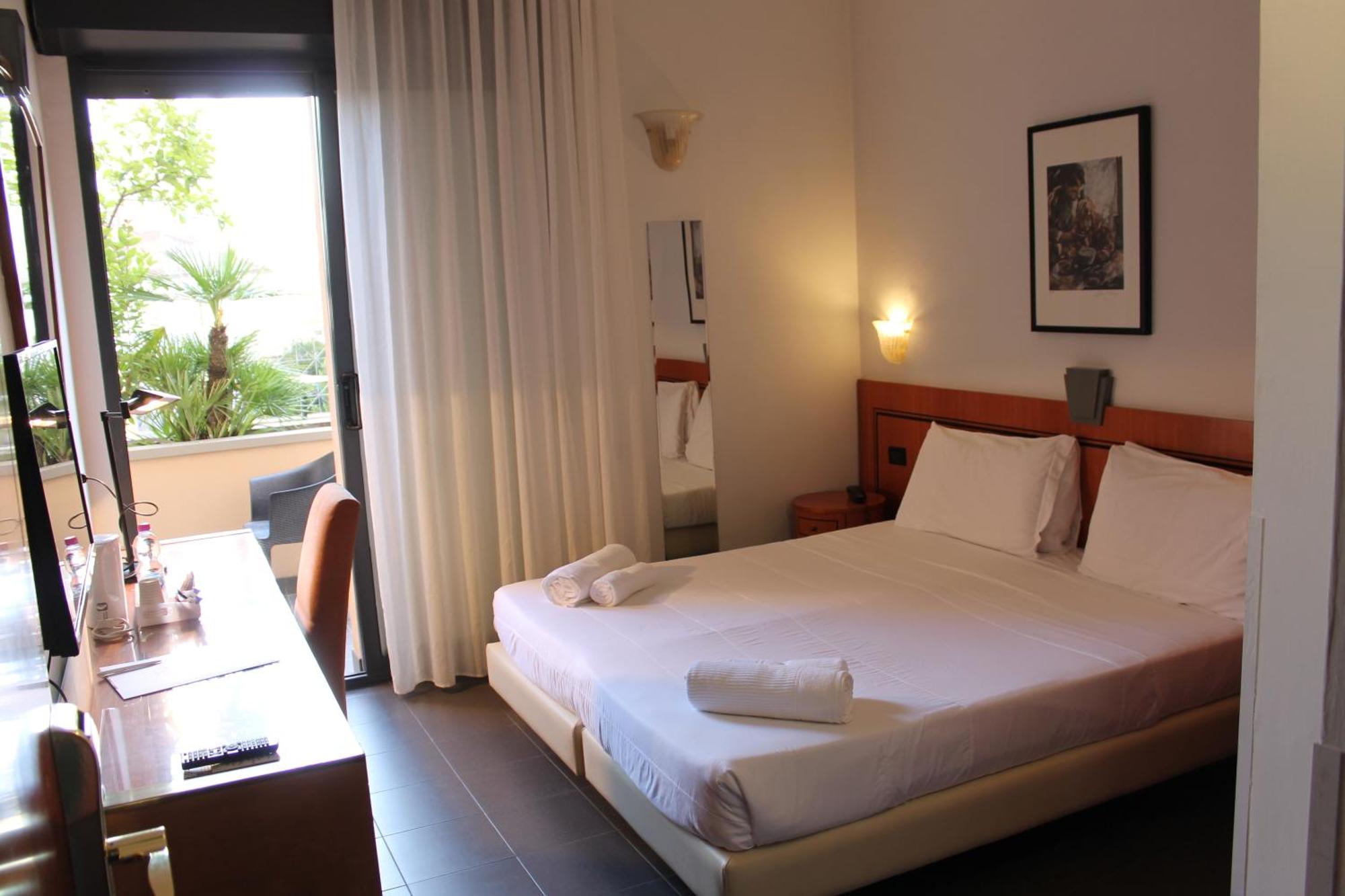 Hotel Nettunia Римини Номер фото